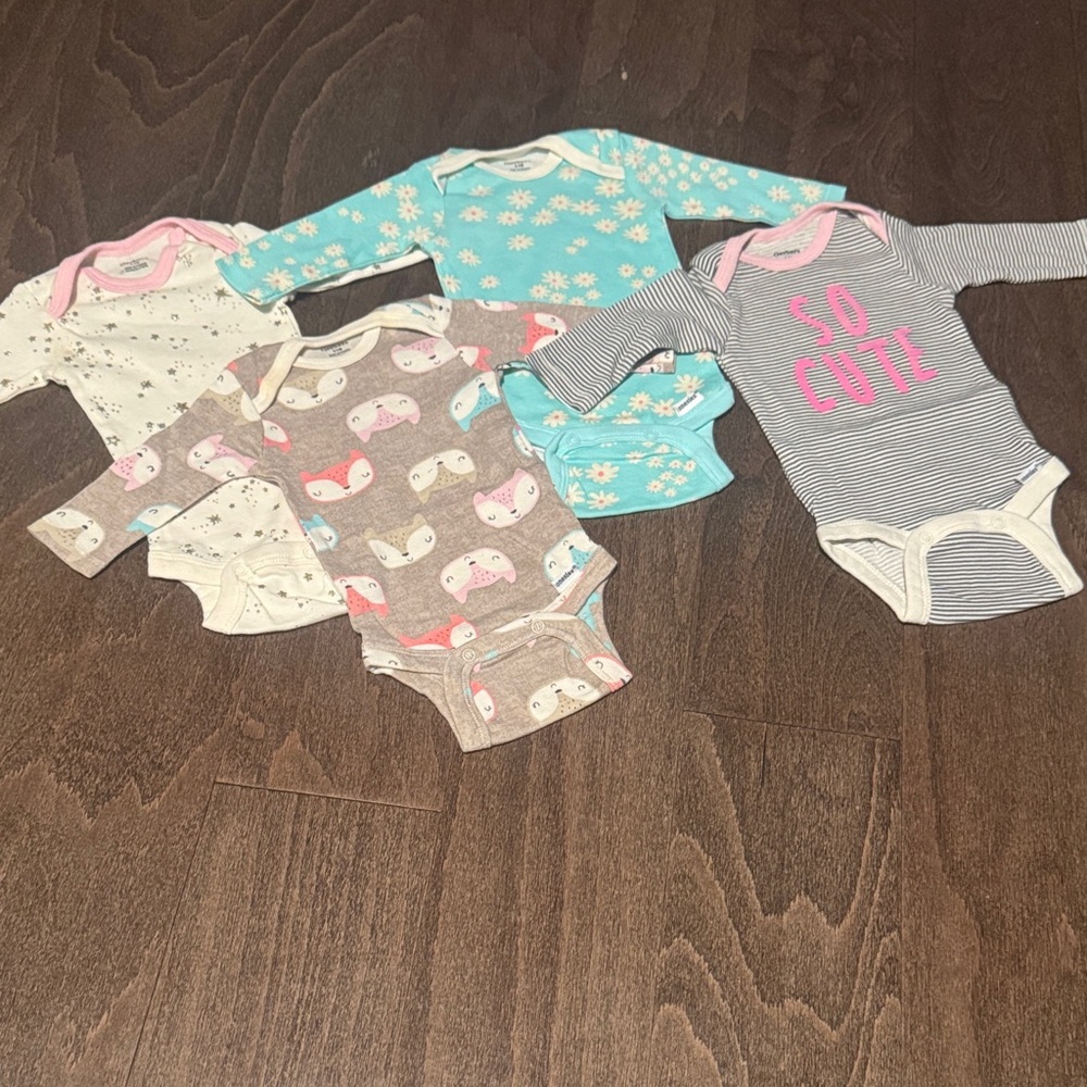 Gerber Baby Bodysuits in Pink, Blue, and Brown